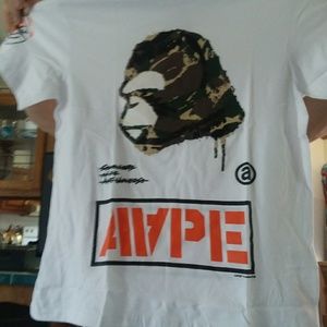 AAPE COTTON T- SHIRT , SIZE LARGE , STILL IN PLAST